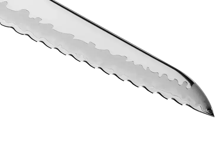 Close-up of the Sora Bread Knife blade showing its unique push-pull serration pattern.
