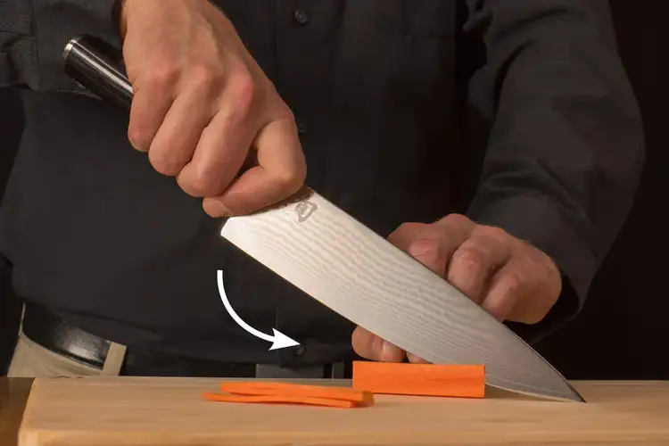 Demonstration of the chef’s pinch grip and cutting motion using a Shun knife and julienned carrots. Click to shop the Classic 8" Chef's Knife.