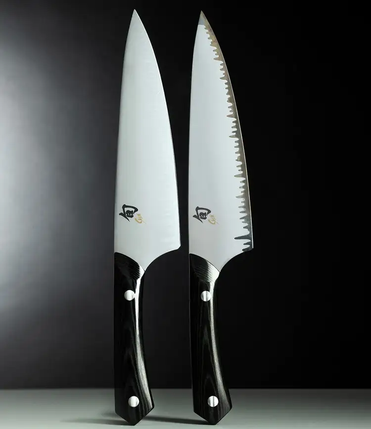 Two Narukami Shun knives shown side by side, one new and one with a developed patina.
