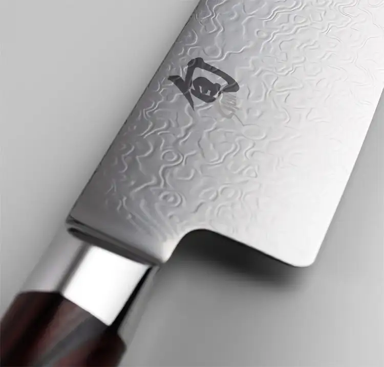 Close-up of the textured Damascus surface of the Kohen blade.