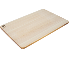 Medium Hinoki board with urushi edge angled view showing urushi edge