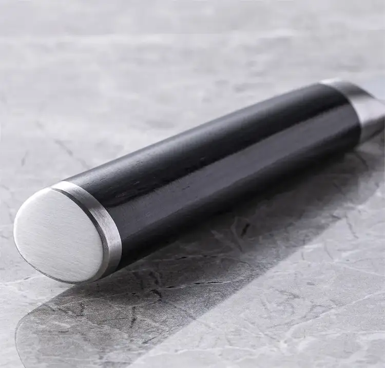 A close up of the handle of a Classic Knife, endcap pointed towards the camera.