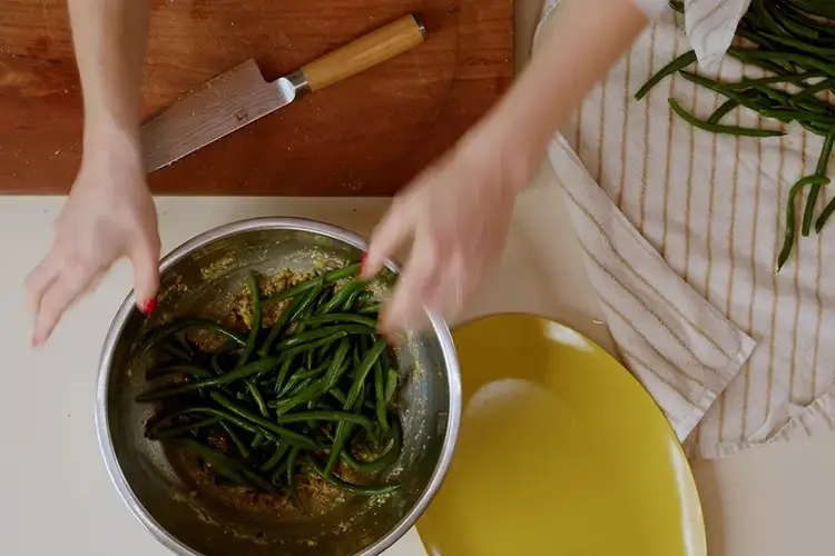 Molly Baz prepares the green beans.