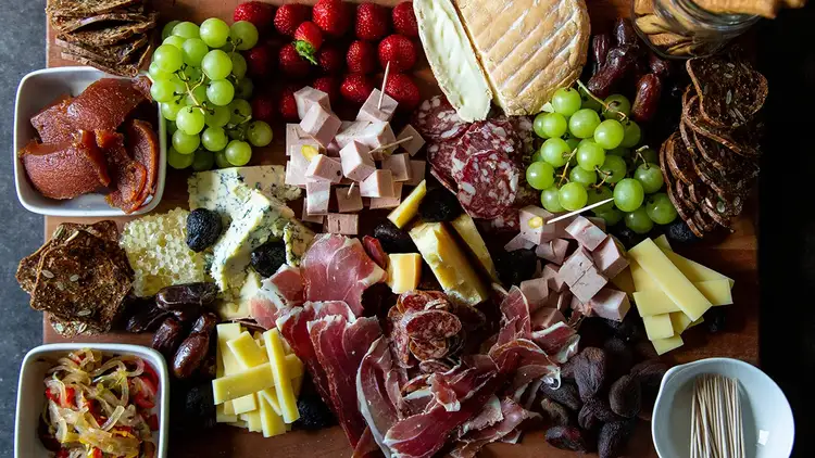 Charcuterie Board with meats, cheeses, vegetables and fruit with Sweet & Sour Pepper Relish