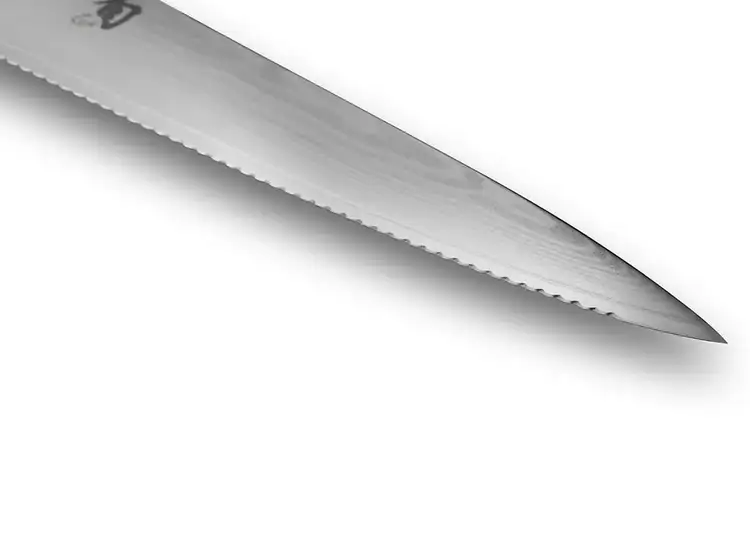 Classic Serrated Utility Knife with rounded, saw-free serrations designed for smooth slicing.