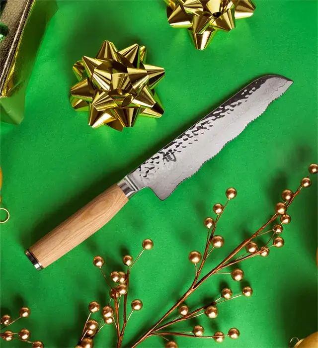 A Premier Blonde Serrated Master Utility Knife.