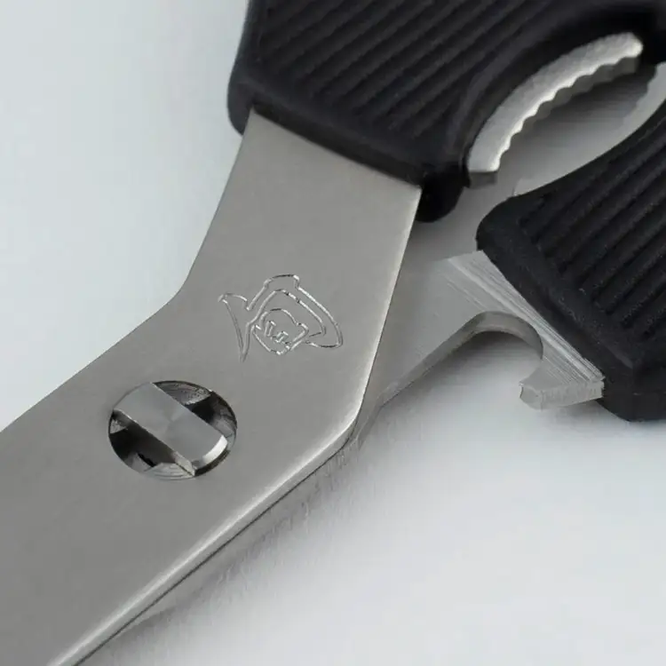 Close-up detail of Shun Multipurpose Shears blade, pivot screw, and lid lifter.