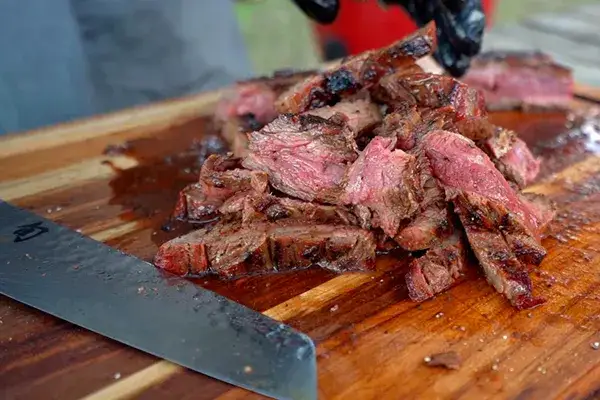 Close up of freshly sliced jucy flank steak right off the grill.